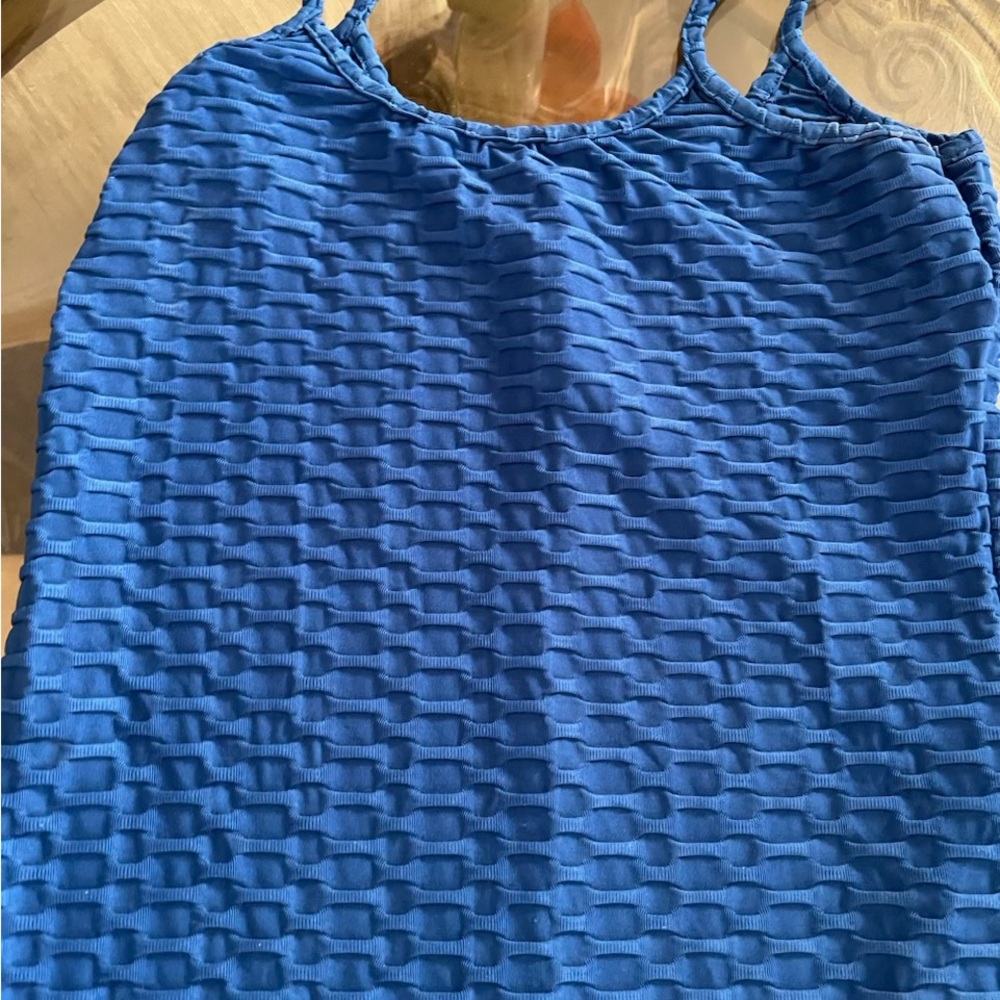 Blue Textured Sleeveless Jumpsuit With Long Pants